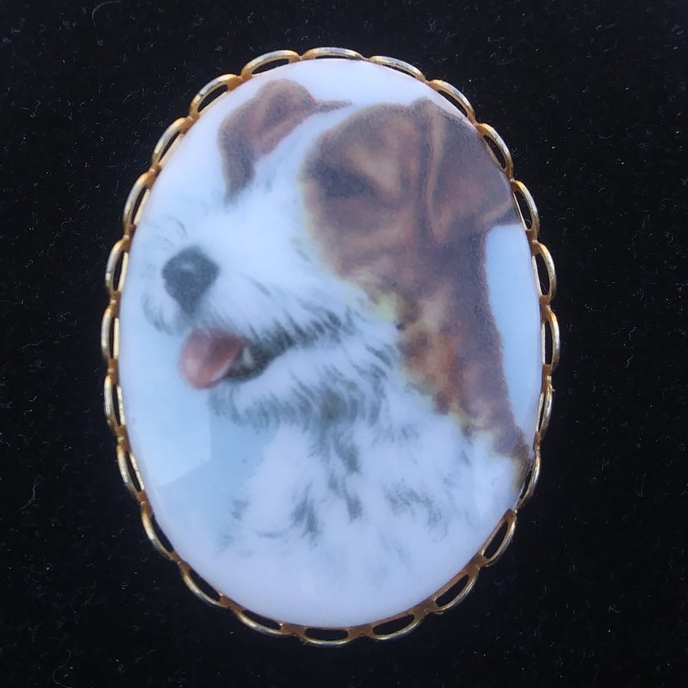 vintage painted porcelain image of a dog brooch